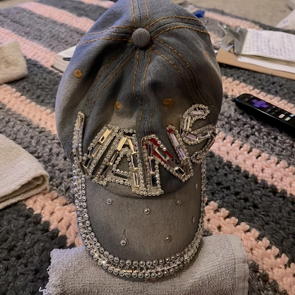 Light blue jeans material hat with gems.